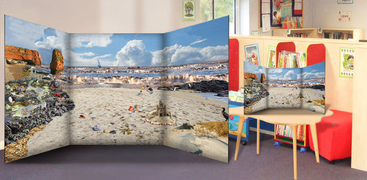 A classroom or nursery scene setter of an inviting sandy beach scene and bay, complete with rockpool and beach creatures for children to find! Great for immersive and imaginative role play. Great for talking about holidays and beach fun and safety by the sea. The freestanding scene setter can be used inside & outside. Made from lightweight correx which is easy to clean and waterproof. The scene setter folds away easily for storage and folds out simply and quickly for set up.