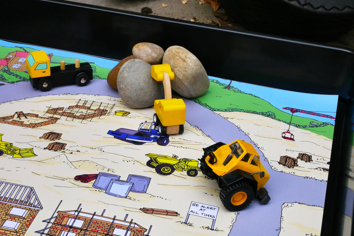 This Building Site Mat is ideal for use with our Tiger Play Tray. It's perfect for individual or small group play.      Can be used with character toys and vehicles for imaginative play or for messy play.